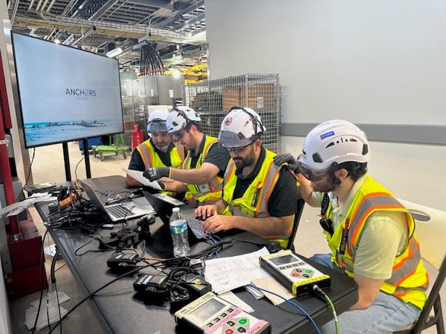 Anchors commissioning team at the test desk